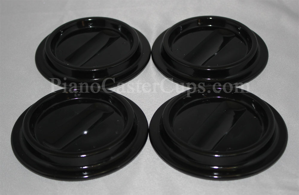 black plastic piano caster cup